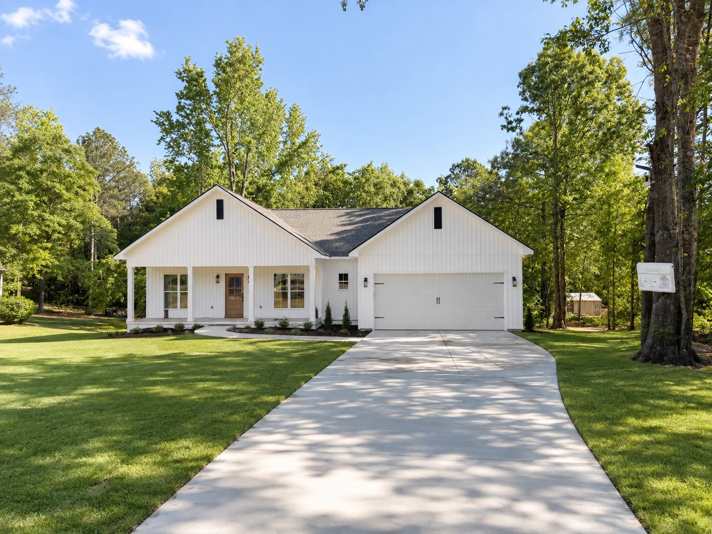 Completed white custom home exterior
